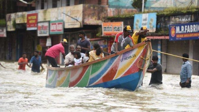 Kerala fishermen rescuing residents during the 2018 floods