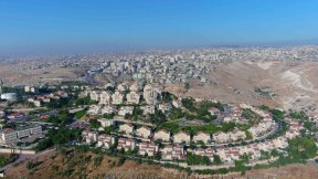 The Israeli settlement of Maale Adumim in the occupied West Bank, with the Palestinian neighborhoods of occupied East Jerusalem in the background.