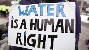 Sign in which is written "Water is a human rights".