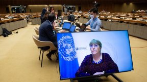 Michelle Bachelet (on screen), UN High Commissioner for Human Rights, addresses the 30th Special Session of the Human Rights Council on the “Grave Human Rights Situation in the Occupied Palestinian Territory, including East Jerusalem”, at Palais des Natio