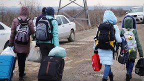 A group of women fleeing Ukraine arrive in Moldova