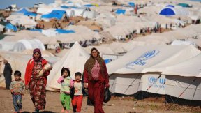 Alcuni rifugiati siriani in un campo delle Nazioni Unite.