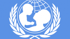 UNICEF logo, United Nations fund for childhood, representing a woman and baby silhouette inside a stylized globe