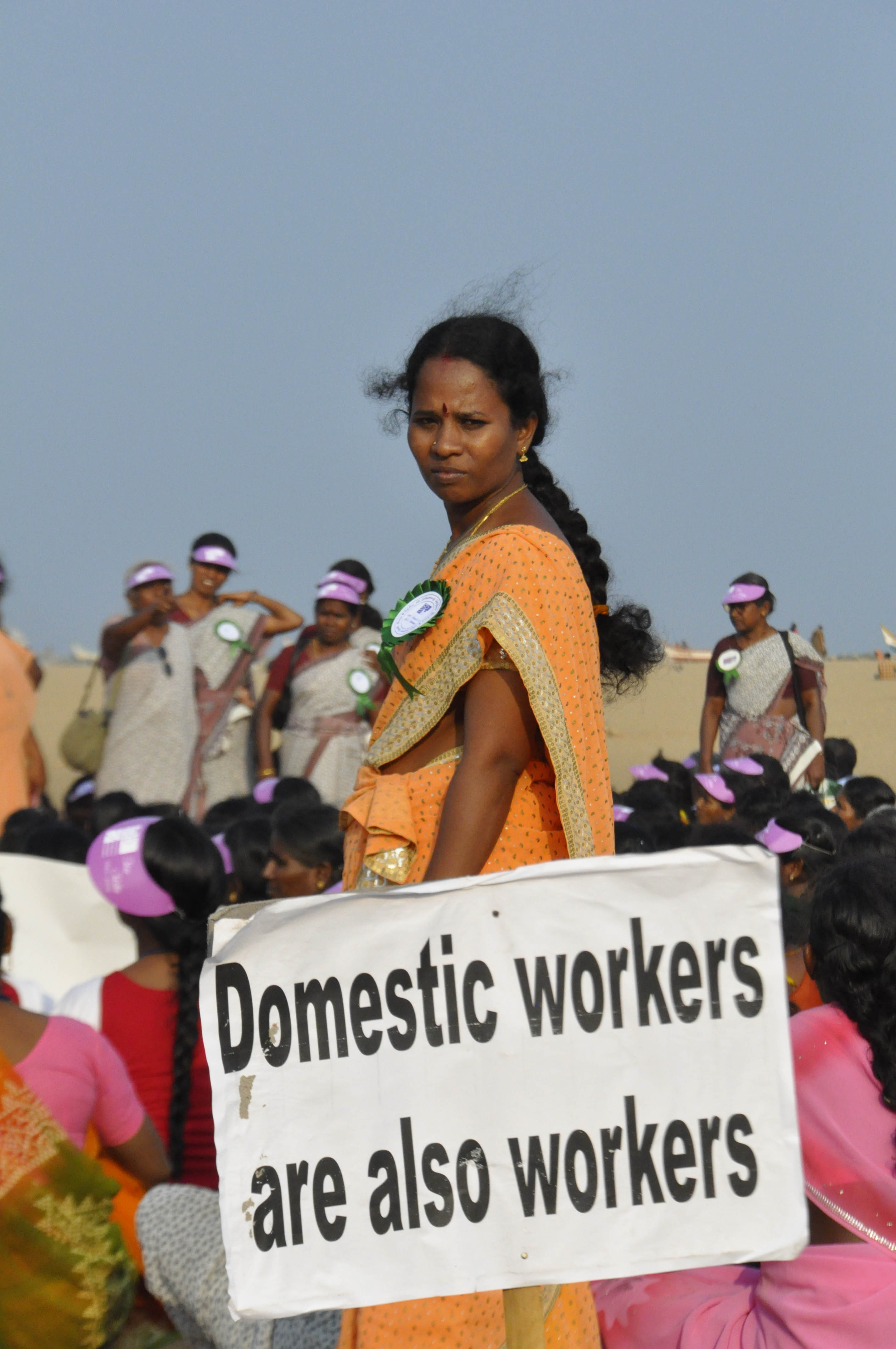 This photo is the result of a photographic competition organized by the International Labour Office New Delhi branch to promote decent work for domestic workers. Original caption by the author: Domestic workers are also workers: Around four thousand Dome