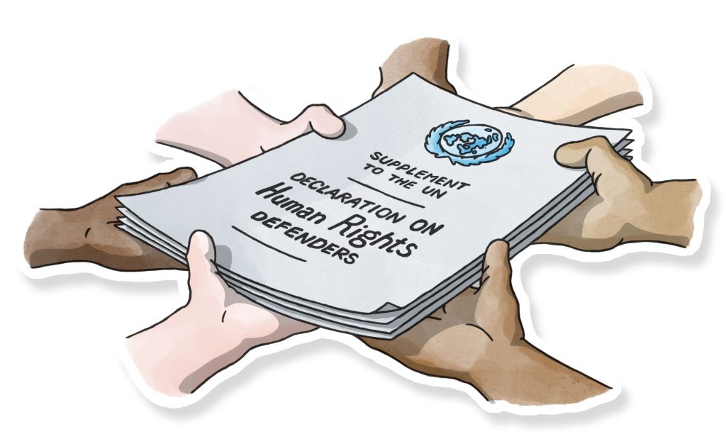 Hands holding a document entitled: "Supplement to the UN, declaration on human rights defenders"