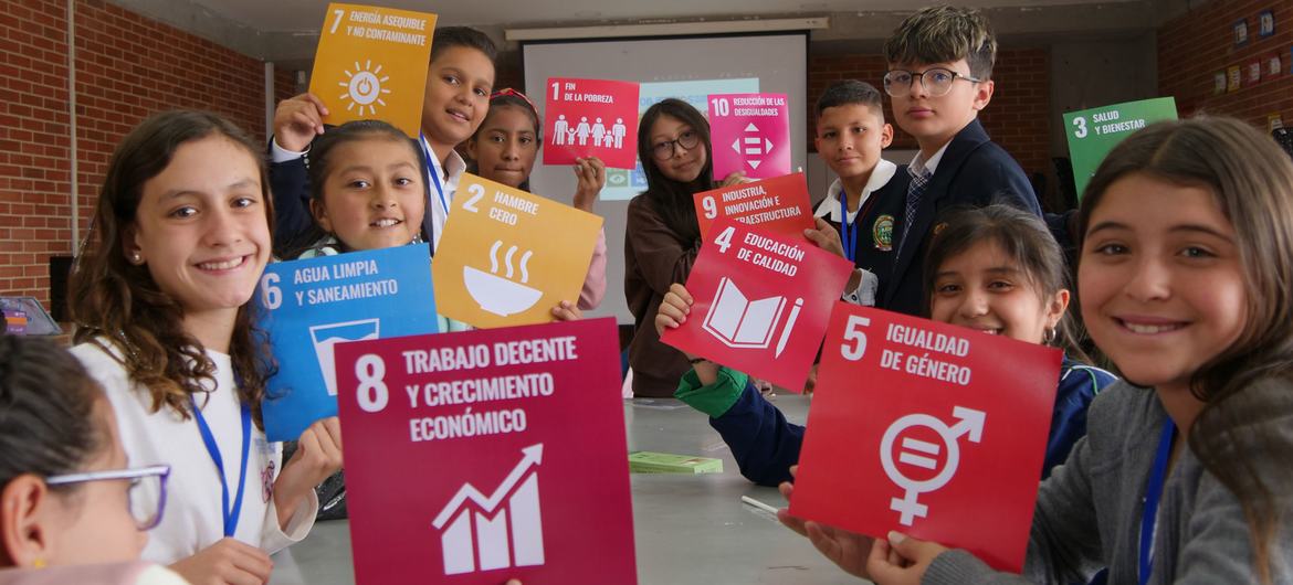 "School children in Bogotá, Colombia hold SDG signs"