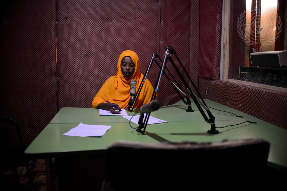 A presenter reads the news at Radio Shabelle, one of Mogadishu's most popular radio stations.
With a population that is still one of the world's poorest, radio continues to be one of the primary sources of information for many in Somalia. However, while peace has largely returned to Somalia's capital of Mogadishu, journalists working in the city continue to face huge risks in their effort to report the news. As of December this year, 18 media workers have been killed in Somalia as a result of IED explosions, grenade attacks, and targeted assassinations.