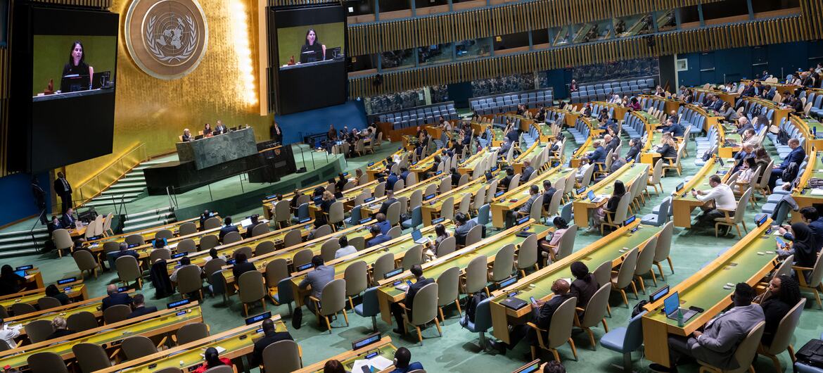 General Assembly President Annalena Baerbock (on screen) chairs the General Assembly meeting on strengthening of the United Nations System