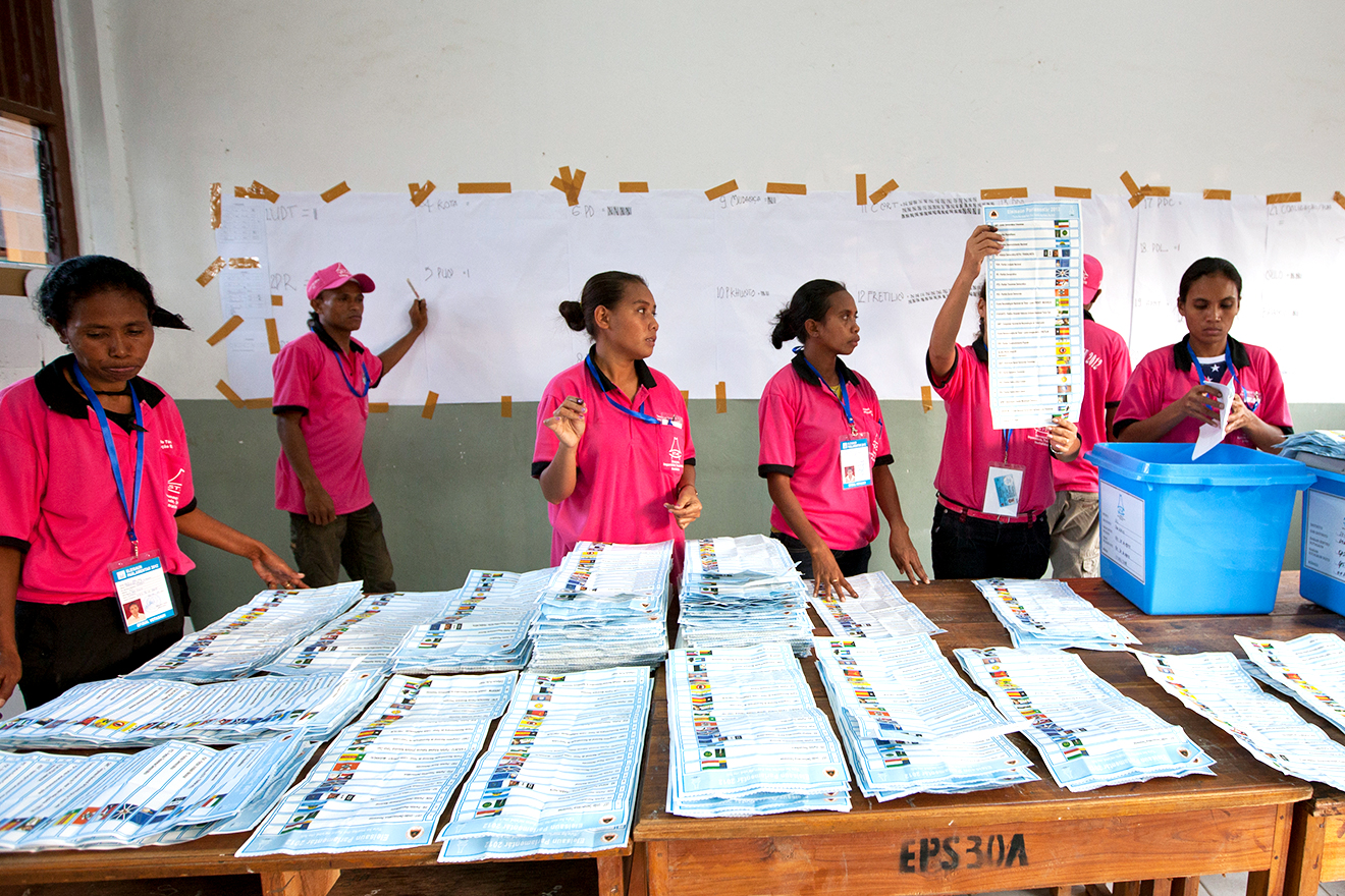 polling-officers-tally-votes-at-a-polling-station-after-ballots-were-cast-in-timor-leste-parliamentary-elections520232