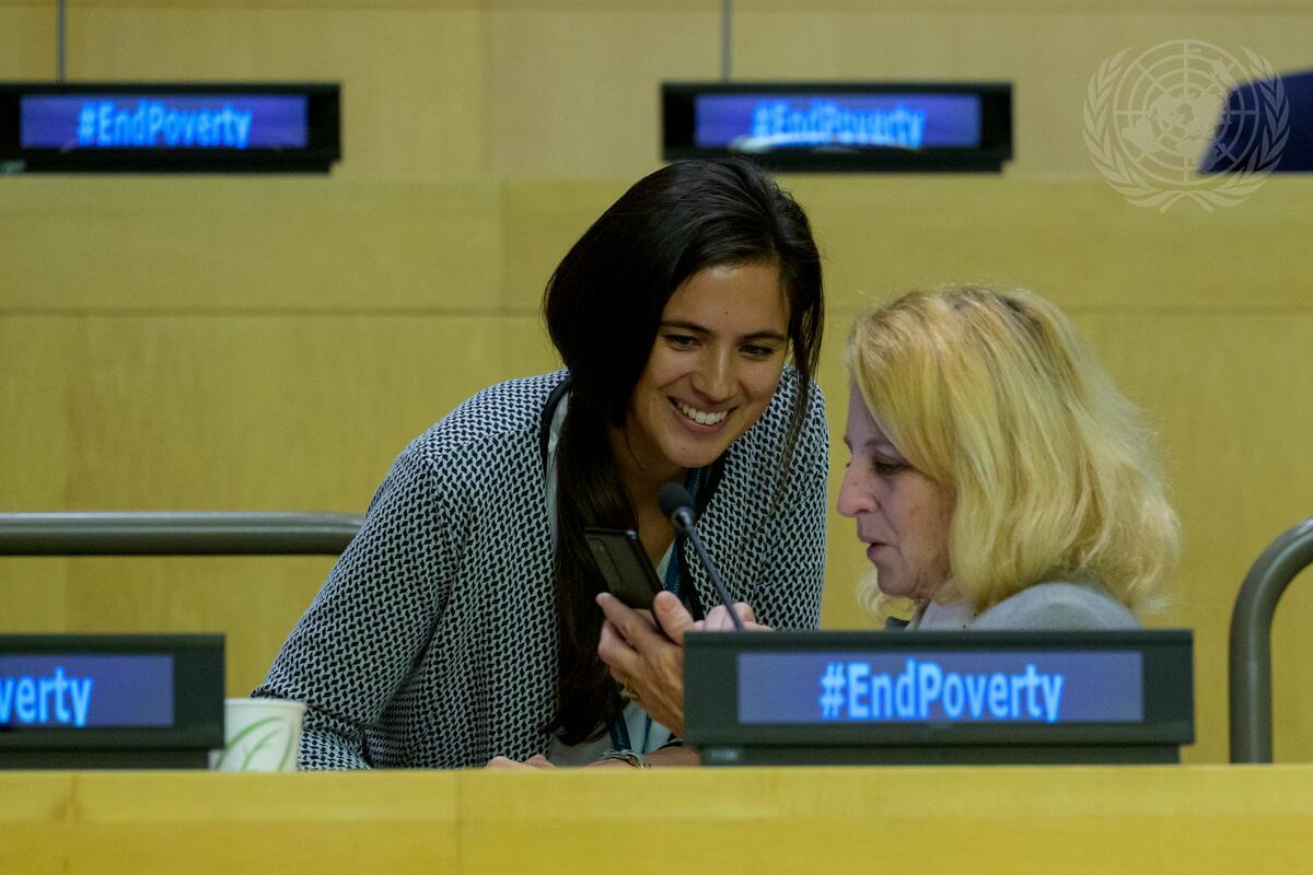 An view of two participants during the event held to commemorate the International Day for the Eradication of Poverty on the theme: Dignity For All in Practice and the commitments we make together for social justice, peace, and the planet.